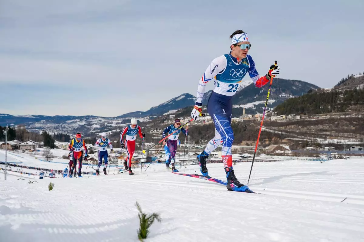 Theo Schely, of France, competes in the cross country skiing men's 50km mass start Classic at the 2026 Winter Olympics, in Tesero, Italy, Saturday, Feb. 21, 2026. (AP Photo/Evgeniy Maloletka)