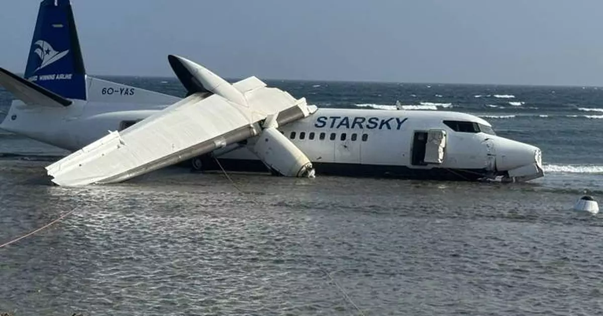 Passenger plane in Somalia overshoots the runway into shallow seawater near the airport