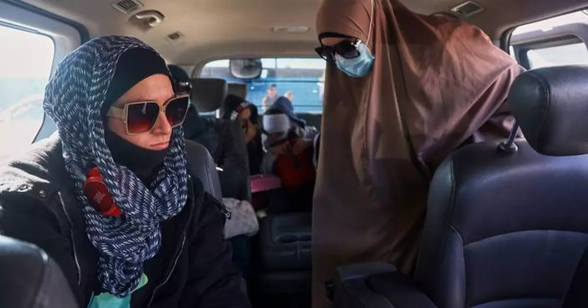 Australians with alleged IS ties are turned back after departing Syrian camp for repatriation