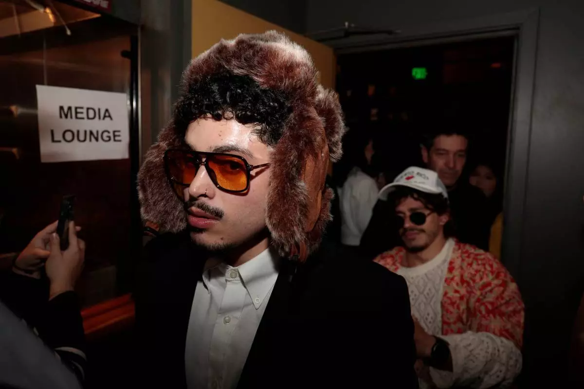 Contestants line up at the Bad Bunny look-alike contest line up at Tacolicious in San Francisco, Thursday, Feb. 5, 2026. (Giselle Garza Lerma/San Francisco Chronicle via AP)