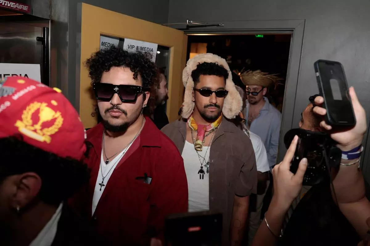 Contestants line up at the Bad Bunny look-alike contest line up at Tacolicious in San Francisco, Thursday, Feb. 5, 2026. (Giselle Garza Lerma/San Francisco Chronicle via AP)