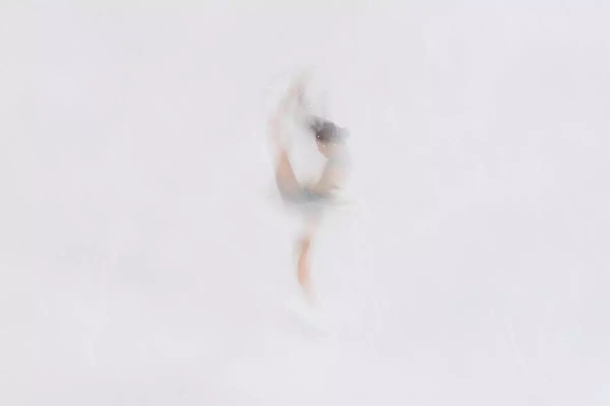 Shin Ji-a of South Korea competes during the women's short program figure skating at the 2026 Winter Olympics, in Milan, Italy, Feb. 17, 2026. (AP Photo/Bernat Armangue, File)