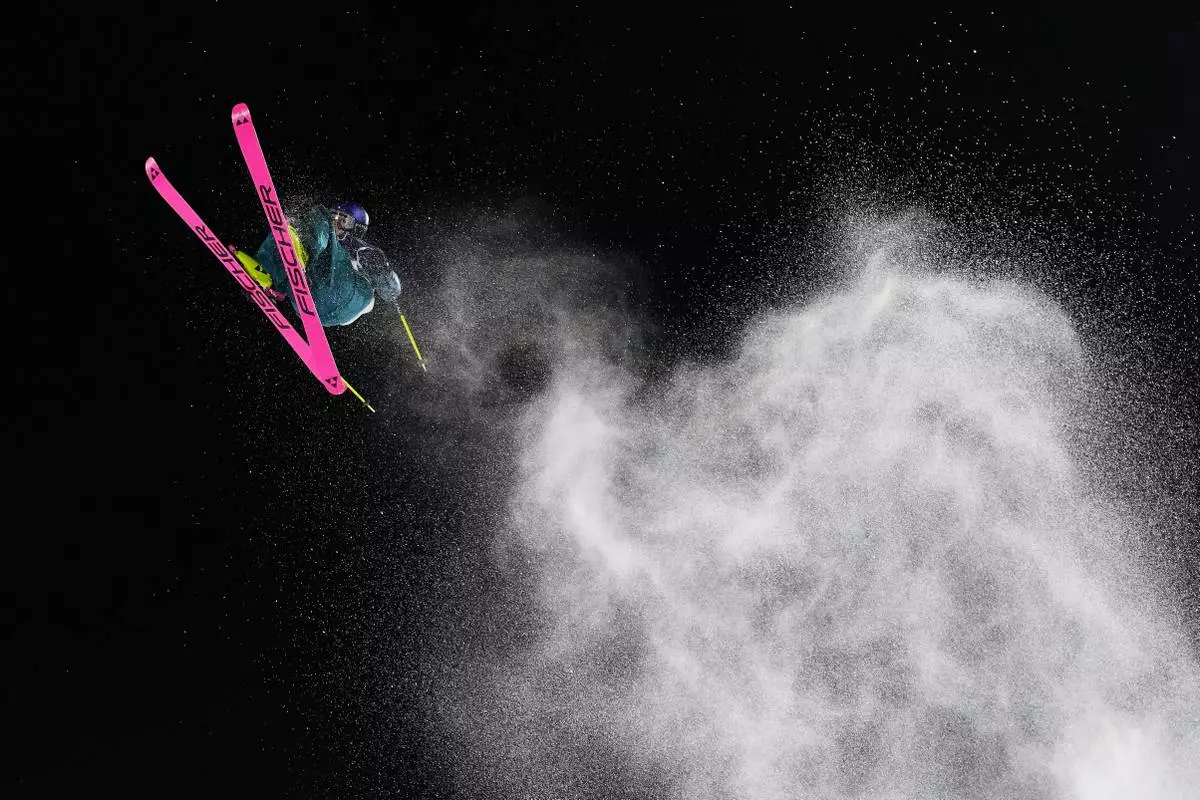 Switzerland's Mathilde Gremaud competes in the women's freestyle skiing big air qualifications at the 2026 Winter Olympics, in Livigno, Italy, Feb. 14, 2026. (AP Photo/Lindsey Wasson, File)