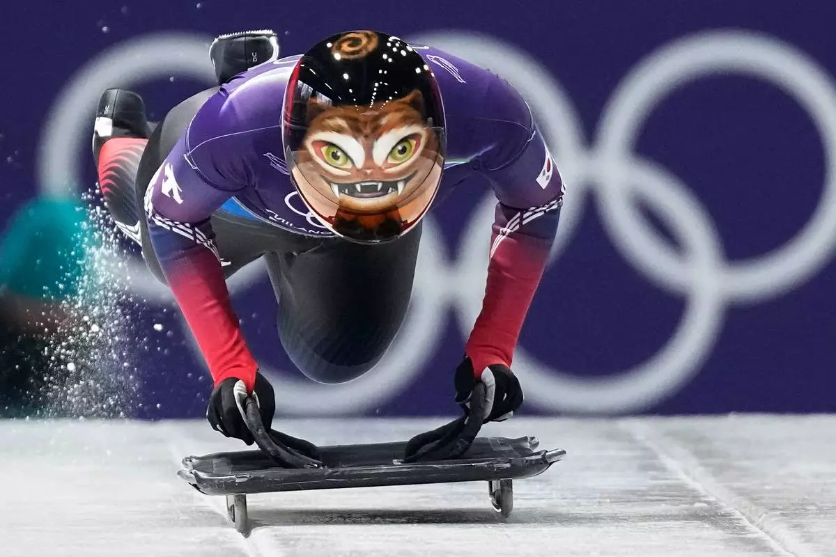 South Korea's Hong Sujung starts for a women's skeleton training session at the 2026 Winter Olympics, in Cortina d'Ampezzo, Italy, Feb. 11, 2026. (AP Photo/Aijaz Rahi, File)