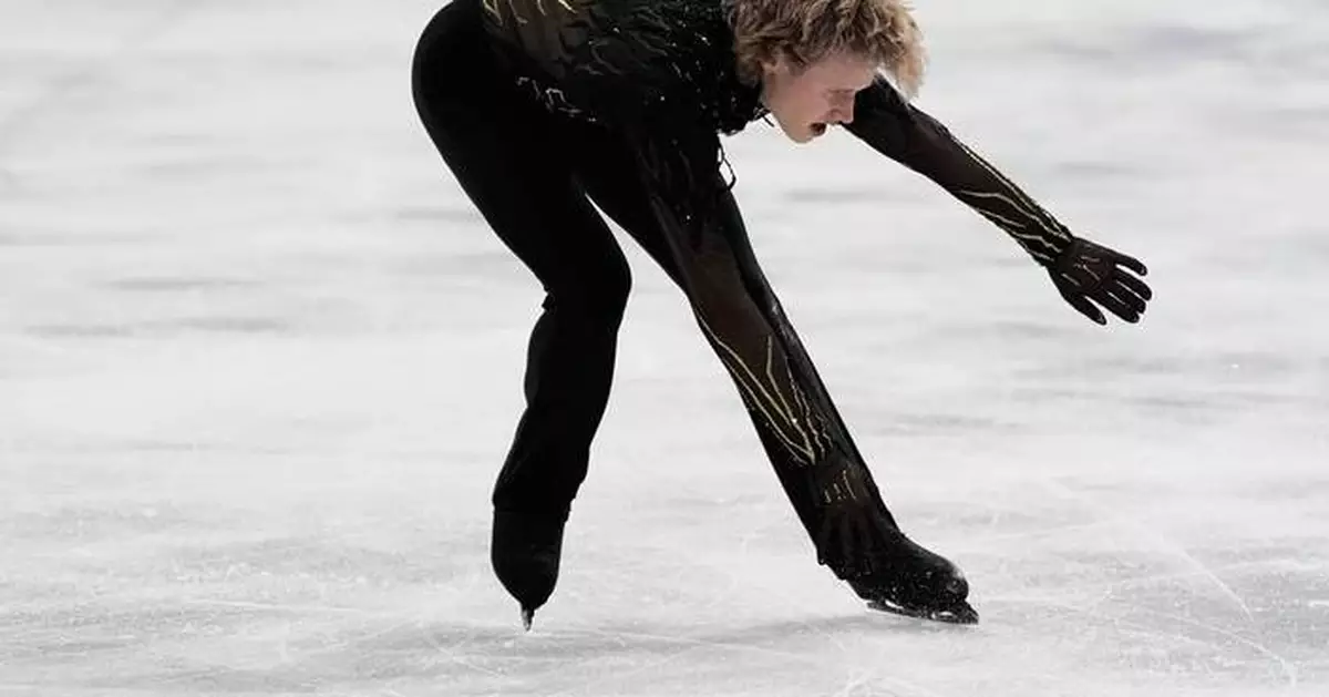 Photos show 'Quad God' Ilia Malinin fall as he fails to win gold