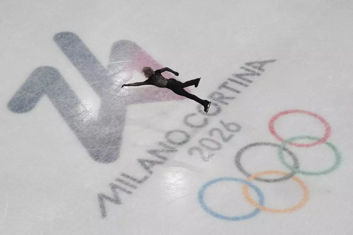 Ilia Malinin of the United States competes during the men's free skate program in figure skating at the 2026 Winter Olympics, in Milan, Italy, Friday, Feb. 13, 2026. (AP Photo/Christophe Ena)
