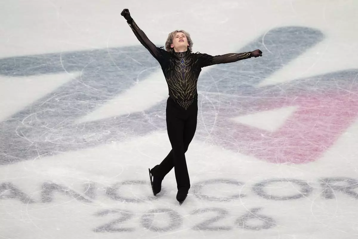 Ilia Malinin of the United States competes during the men's free skate program in figure skating at the 2026 Winter Olympics, in Milan, Italy, Friday, Feb. 13, 2026. (AP Photo/Francisco Seco)