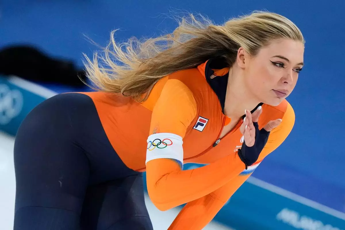 Jutta Leerdam of the Netherlands took a silver medal in the women's 500 meters speedskating race at the 2026 Winter Olympics, in Milan, Italy, Sunday, Feb. 15, 2026. (AP Photo/Luca Bruno)