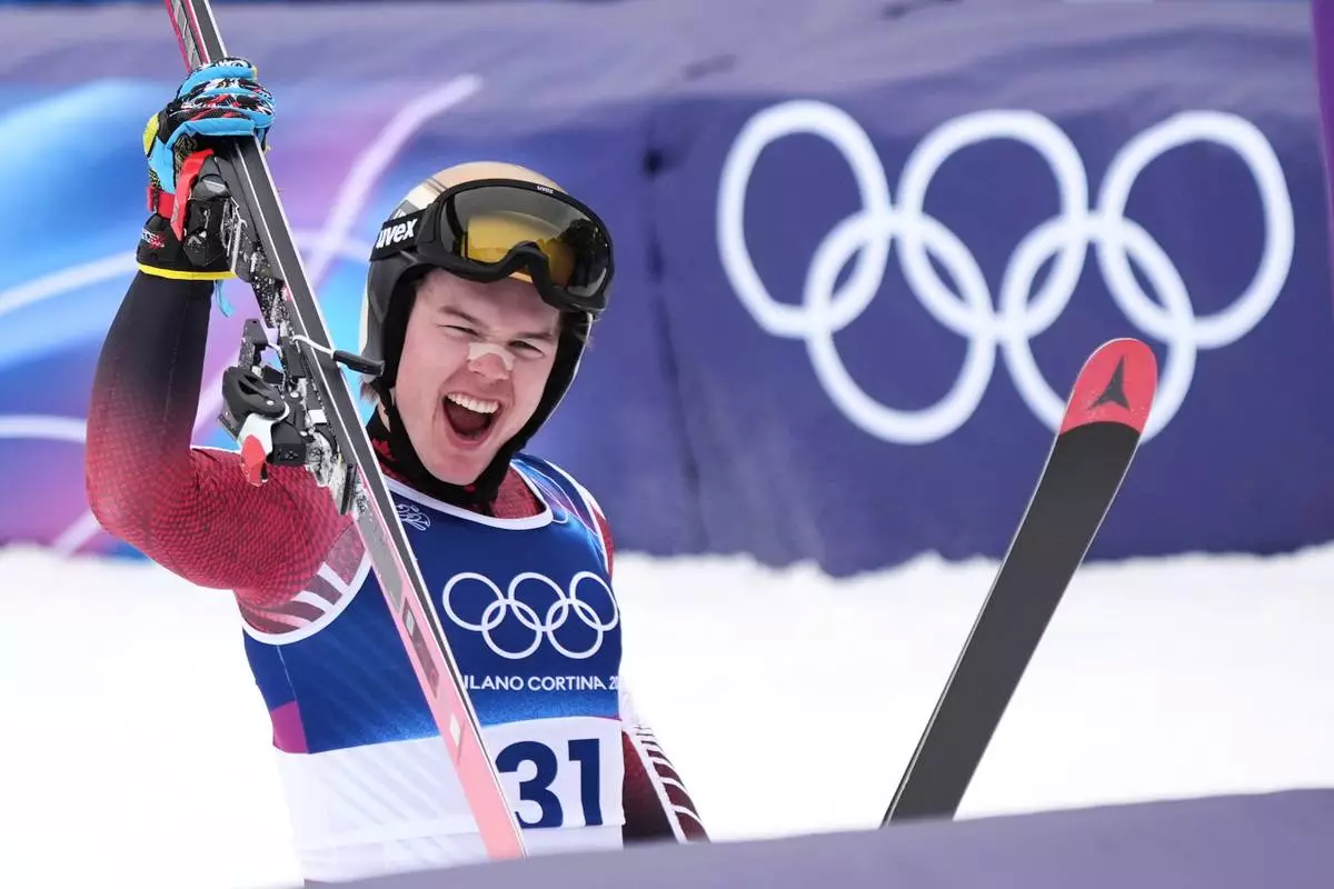 Canada's Jeffrey Read reacts at the finish area during the alpine ski men's downhill first official training, at the 2026 Winter Olympics, in Bormio, Italy, Wednesday, Feb. 4, 2026. (AP Photo/Pier Marco Tacca)