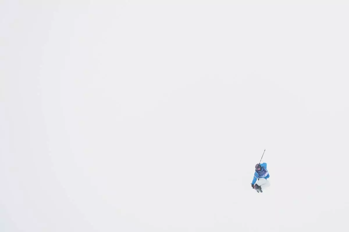 Italy's Flora Tabanelli practices during a slopestyle training session at the 2026 Winter Olympics, in Livigno, Italy, Wednesday, Feb. 4, 2026. (AP Photo/Lindsey Wasson)