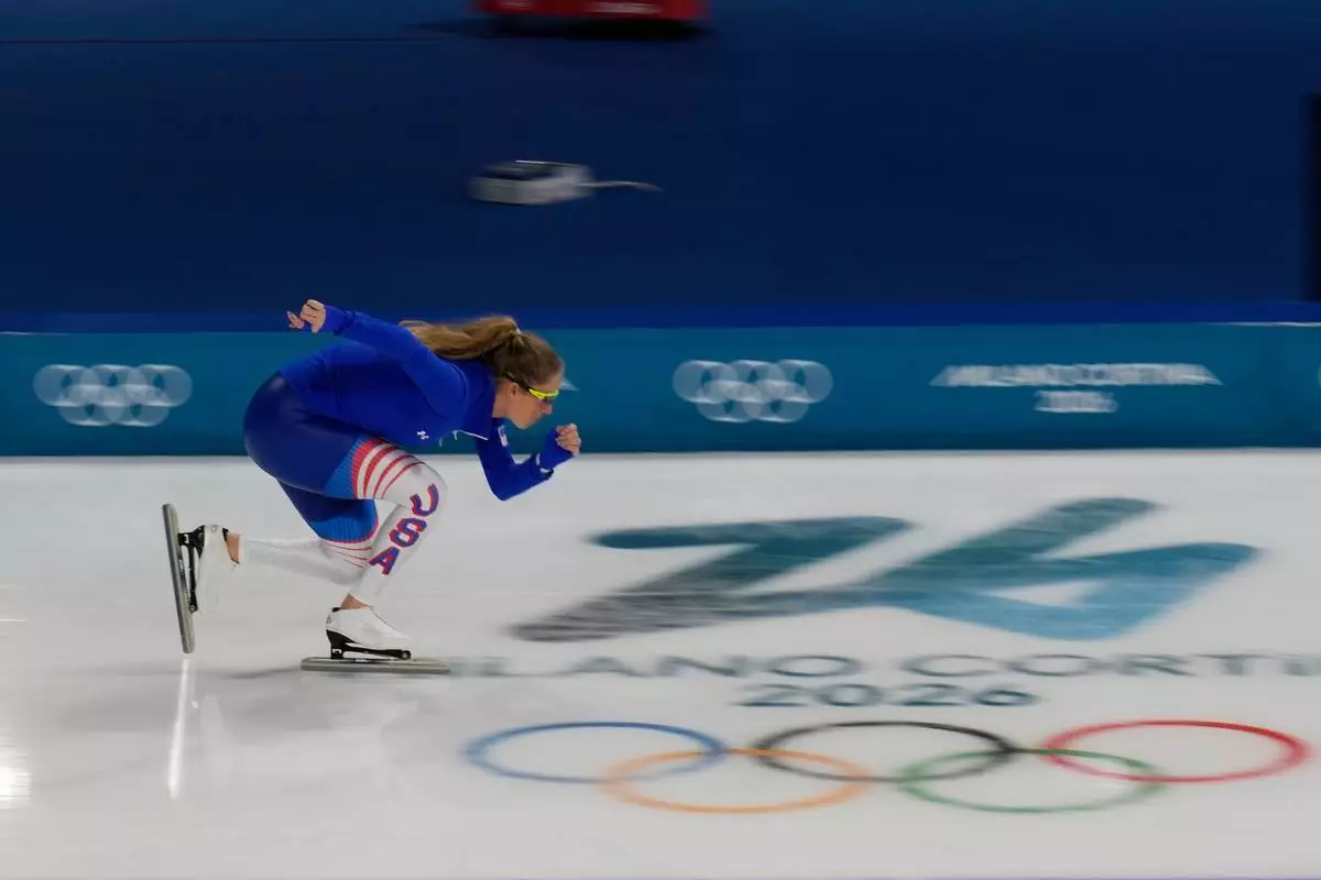 A speed skating athlete from the U.S. warms up at the 2026 Winter Olympics in Rho, Italy, Wednesday, Feb. 4, 2026. (AP Photo/Luca Bruno)