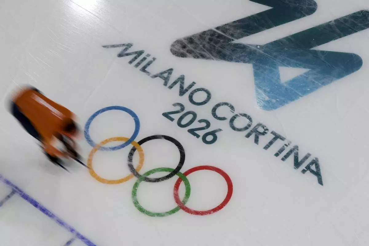 A skater practices on the speedskating rink at the 2026 Winter Olympics, in Milan, Italy, Wednesday, Feb. 4, 2026. (AP Photo/Christophe Ena)