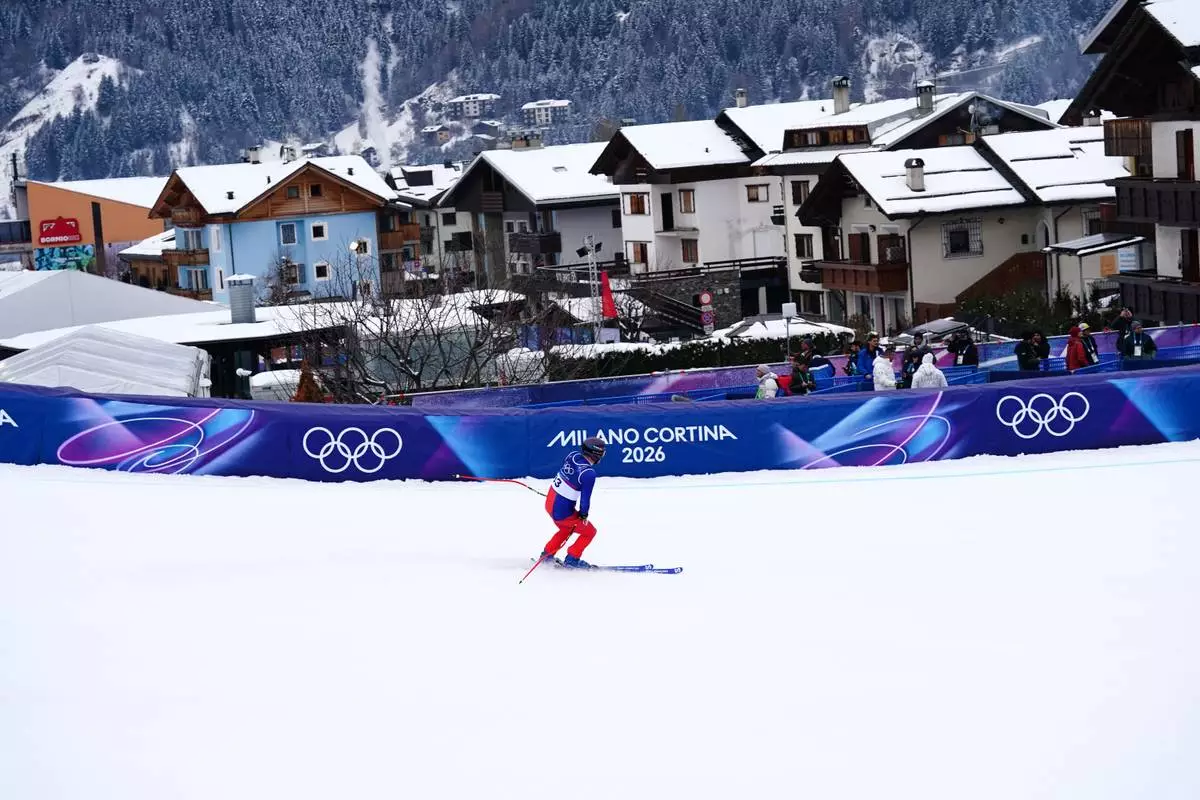 Liechtenstein's Marco Pfiffner gets to the finish area, during the alpine ski, men's downhill first official training, at the 2026 Winter Olympics, in Bormio, Italy, Wednesday, Feb. 4, 2026. (AP Photo/Pier Marco Tacca)