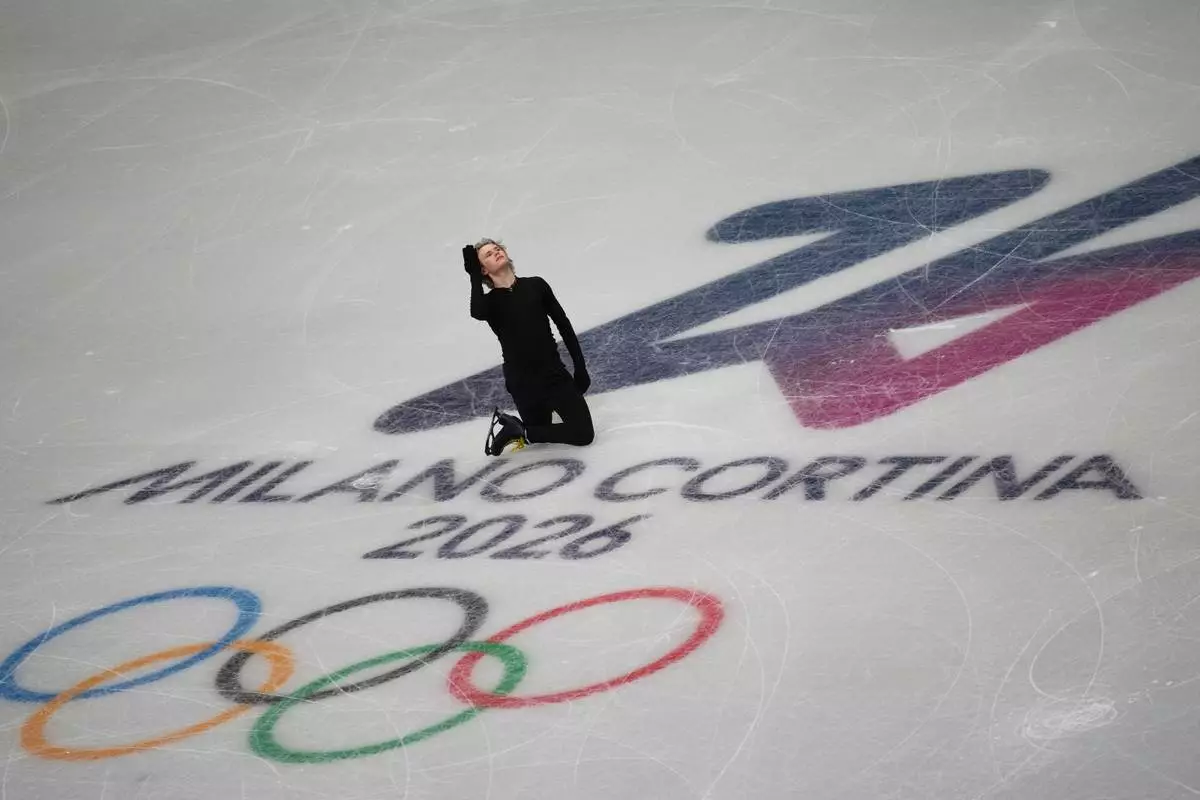 Ilia Malinin, of the United States, practices during a figure skating training session ahead of the 2026 Winter Olympics, in Milan, Italy, Tuesday, Feb. 3, 2026. (AP Photo/Christophe Ena)