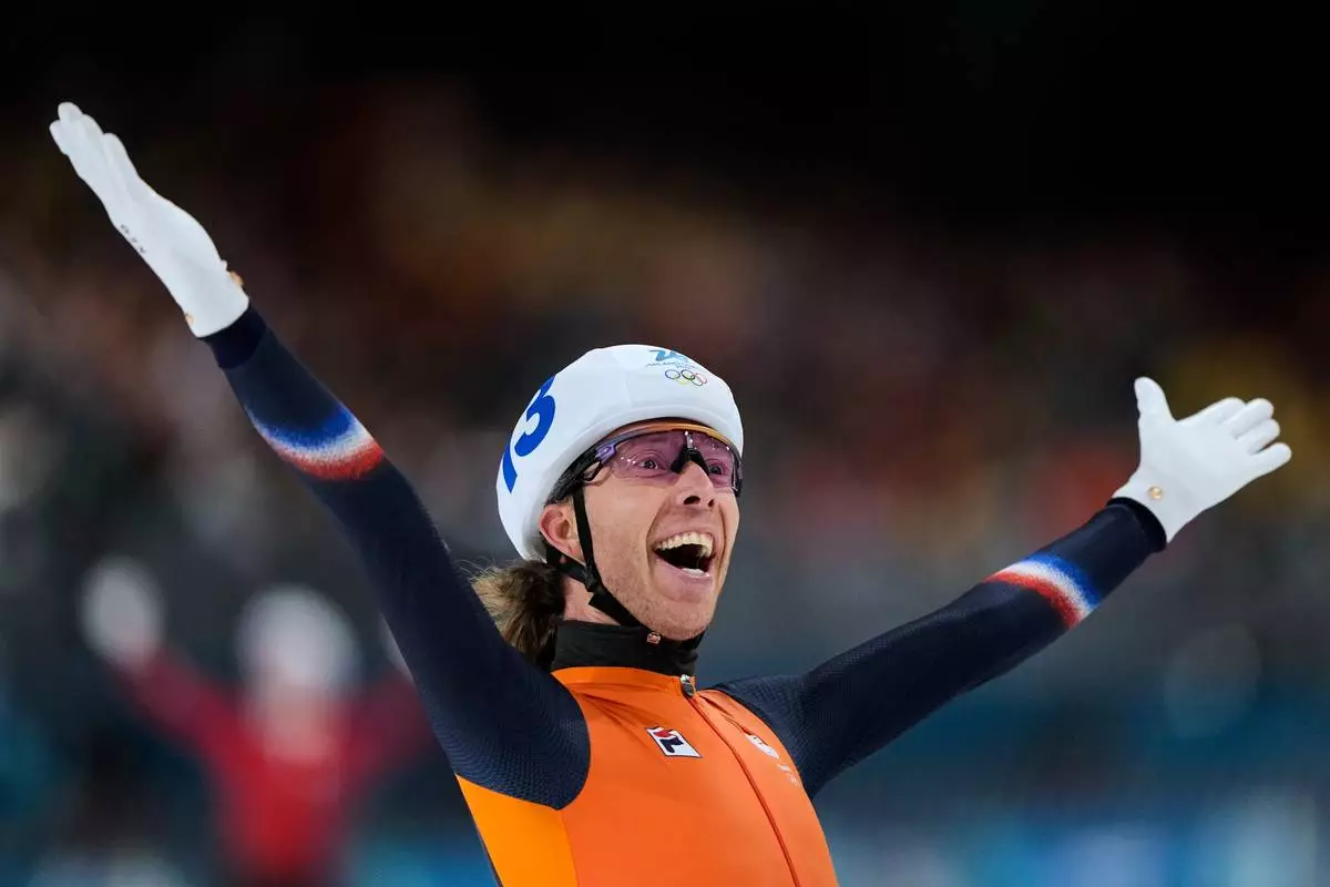 Gold medallist Jorrit Bergsma of the Netherlands celebrates winning the men's mass start final speedskating race at the 2026 Winter Olympics, in Milan, Italy, Saturday, Feb. 21, 2026. (AP Photo/Ben Curtis)