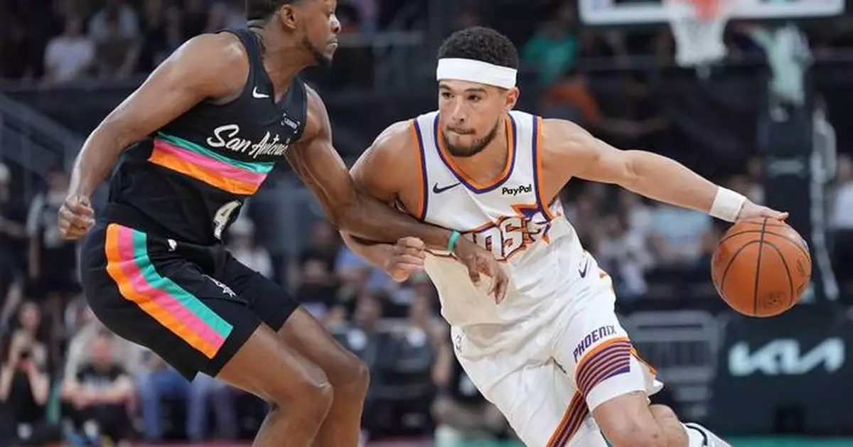 Phoenix Suns All-Star guard Devin Booker out at least 1 week with right hip strain