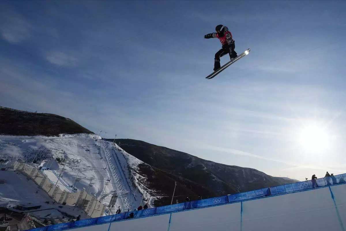 FILE - United States' Shaun White trains before the men's halfpipe finals at the 2022 Winter Olympics, Feb. 11, 2022, in Zhangjiakou, China. (AP Photo/Gregory Bull, File)