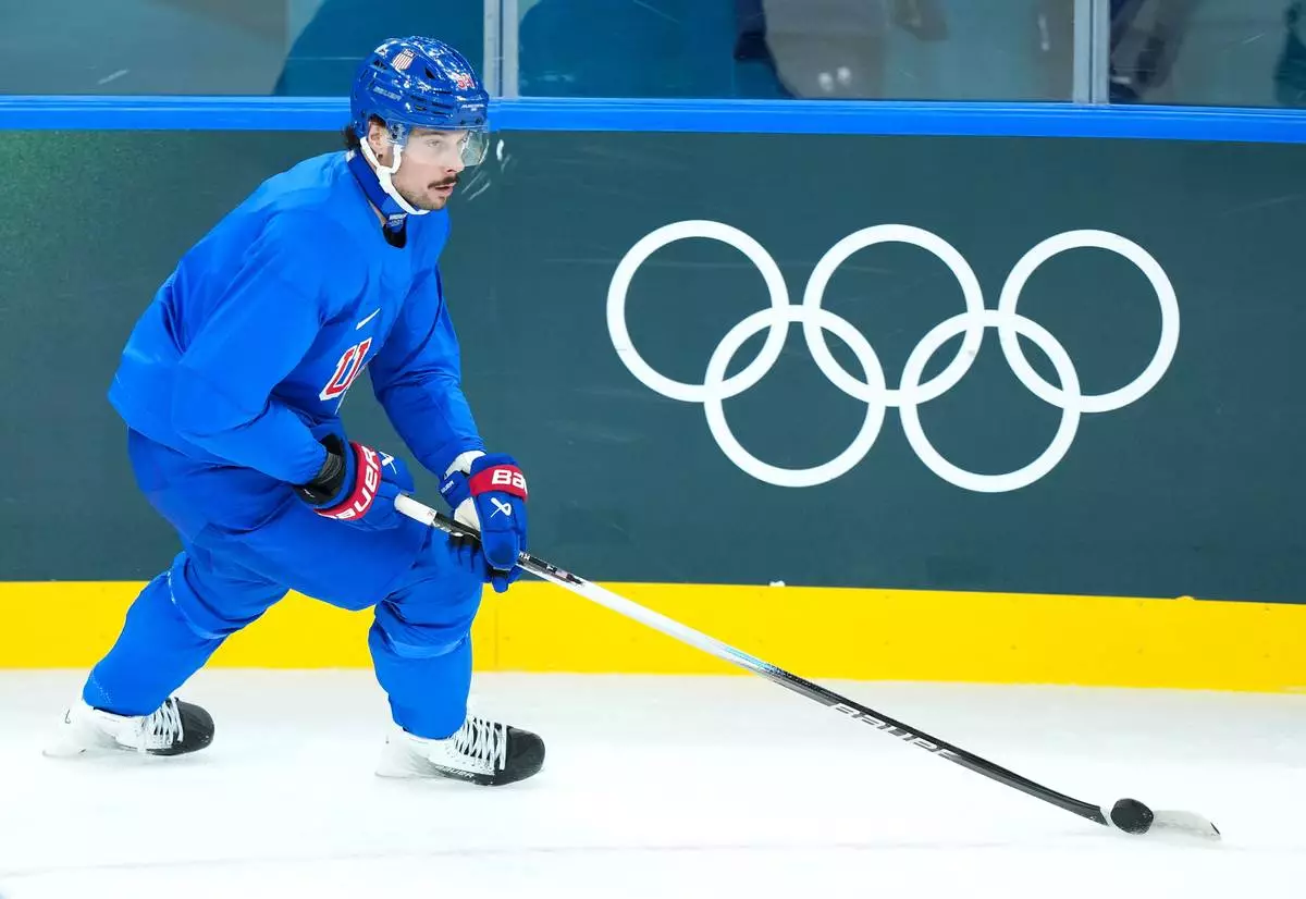 United States forward Auston Matthews takes part in a men's ice hockey practice during the 2026 Winter Olympics in Milan, Italy, Sunday, Feb. 8, 2026. (Nathan Denette/The Canadian Press via AP)
