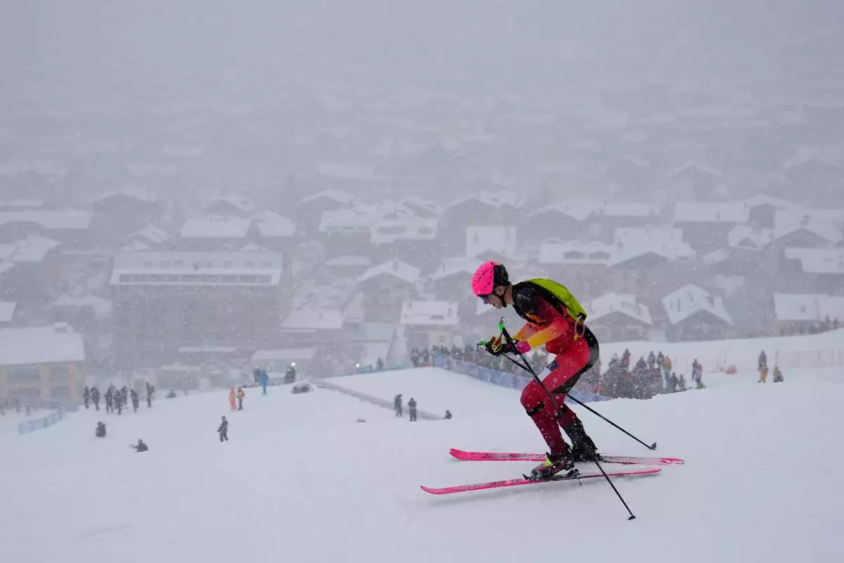 Spain's Oriol Cardona Coll competes during a ski mountaineering men's sprint heat, at the 2026 Winter Olympics, in Bormio, Italy, Thursday, Feb. 19, 2026. (AP Photo/John Locher)