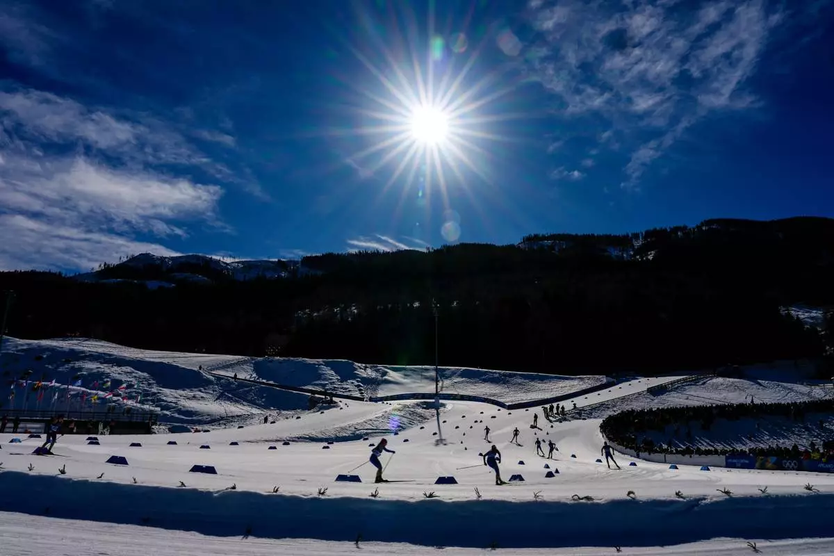 Athletes compete in the cross country skiing men's 4 x 7.5km relay at the 2026 Winter Olympics, in Tesero, Italy, Sunday, Feb. 15, 2026. (AP Photo/Matthias Schrader)