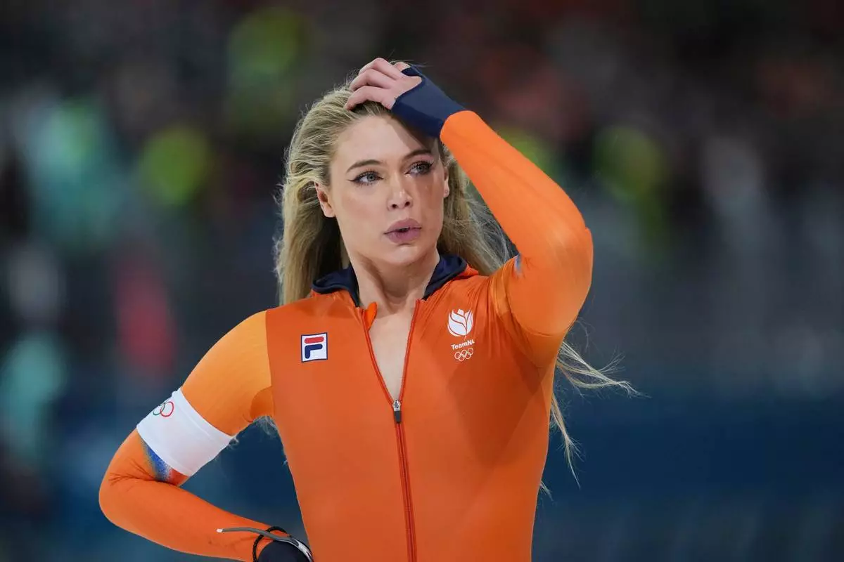 Jutta Leerdam of the Netherlands reacts after competing in the women's 500 meters speedskating race at the 2026 Winter Olympics, in Milan, Italy, Sunday, Feb. 15, 2026. (AP Photo/Antonio Calanni)