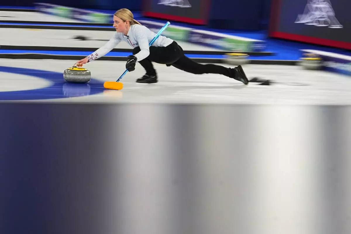 United States' Cory Thiesse competes during a women's curling bronze medal match between Canada and the United States, at the 2026 Winter Olympics, in Cortina d'Ampezzo, Italy, Saturday, Feb. 21, 2026. (AP Photo/Fatima Shbair)