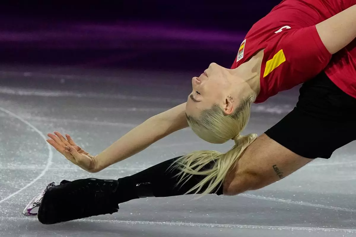 Olivia Smart and Tim Dieck of Spain perform during the figure skating exhibition at the 2026 Winter Olympics, in Milan, Italy, Saturday, Feb. 21, 2026. (AP Photo/Ashley Landis)