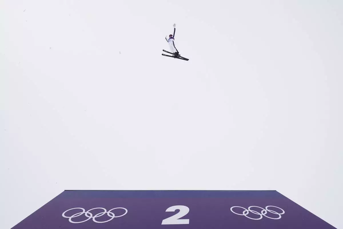 United States' Connor Curran (5-2) practices before the freestyle skiing mixed team aerials final at the 2026 Winter Olympics, in Livigno, Italy, Saturday, Feb. 21, 2026. (AP Photo/Lindsey Wasson)