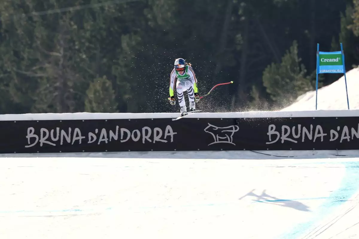 Germany's Emma Aicher speeds down the course during a women's World Cup super-G race, in Soldeu, Andorra, Saturday, Feb. 28, 2026. (AP Photo/Marco Trovati)