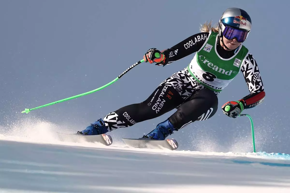New Zealand's Alice Robinson speeds down the course during a women's World Cup super-G race, in Soldeu, Andorra, Saturday, Feb. 28, 2026. (AP Photo/Gabriele Facciotti)