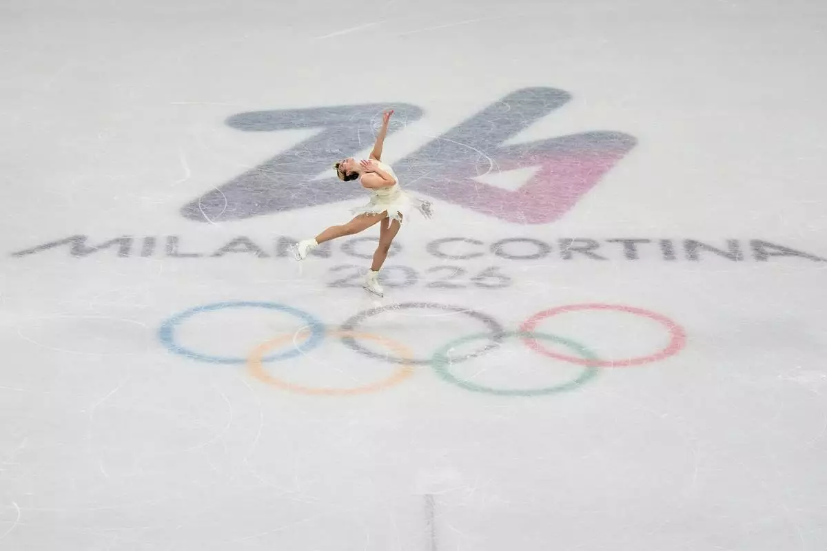 Alysa Liu of the United States competes during the women's short program figure skating at the 2026 Winter Olympics, in Milan, Italy, Tuesday, Feb. 17, 2026. (AP Photo/Ashley Landis)