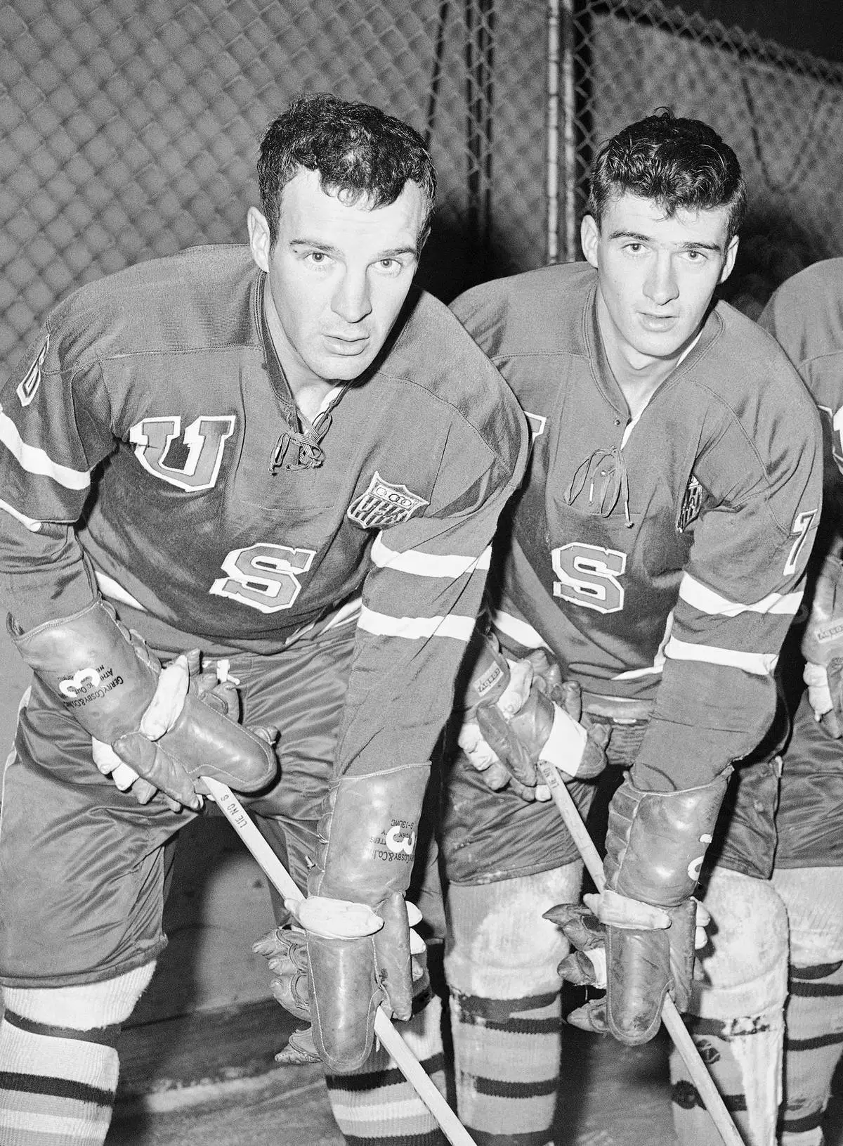 FILE - U .S. Olympic ice hockey forwards Roger Christian, left, and Bill Christian pose Jan. 6, 1960, at the United States Military Academy in West Point, N.Y. (AP Photo/John Rooney, File)
