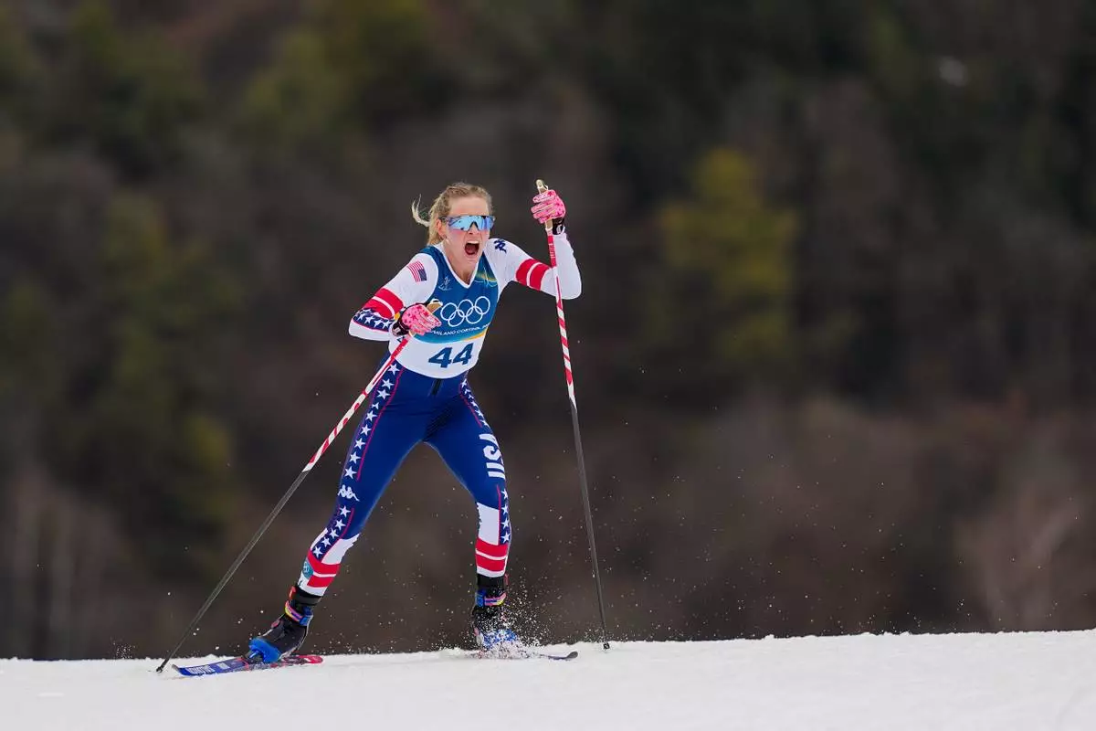 Jessie Diggins, of the United States, competes in the cross country skiing women's 10km interval start free at the 2026 Winter Olympics, in Tesero, Italy, Thursday, Feb. 12, 2026. (AP Photo/Matthias Schrader)