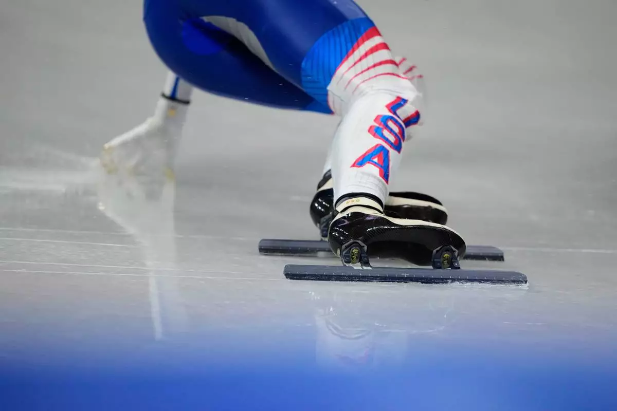 Kristen Santos-Griswold of the United States competes during the short track speed skating women's 500m at the 2026 Winter Olympics, in Milan, Italy, Thursday, Feb. 12, 2026. (AP Photo/Natacha Pisarenko)
