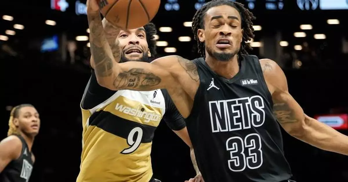 Nets score 80 points in the first half and beat the short-handed Wizards 127-113