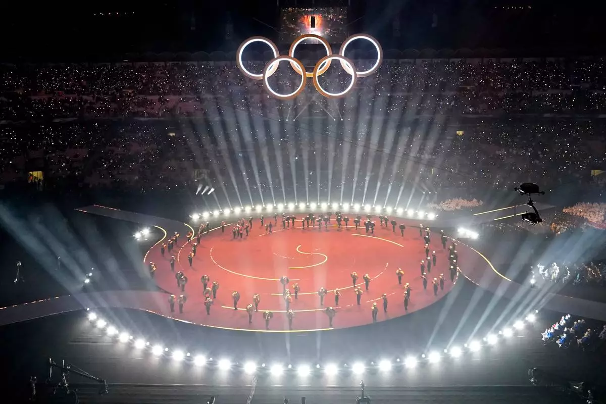 A view of the Olympic opening ceremony at the 2026 Winter Olympics, in Milan, Italy, Friday, Feb. 6, 2026. (AP Photo/Francisco Seco)