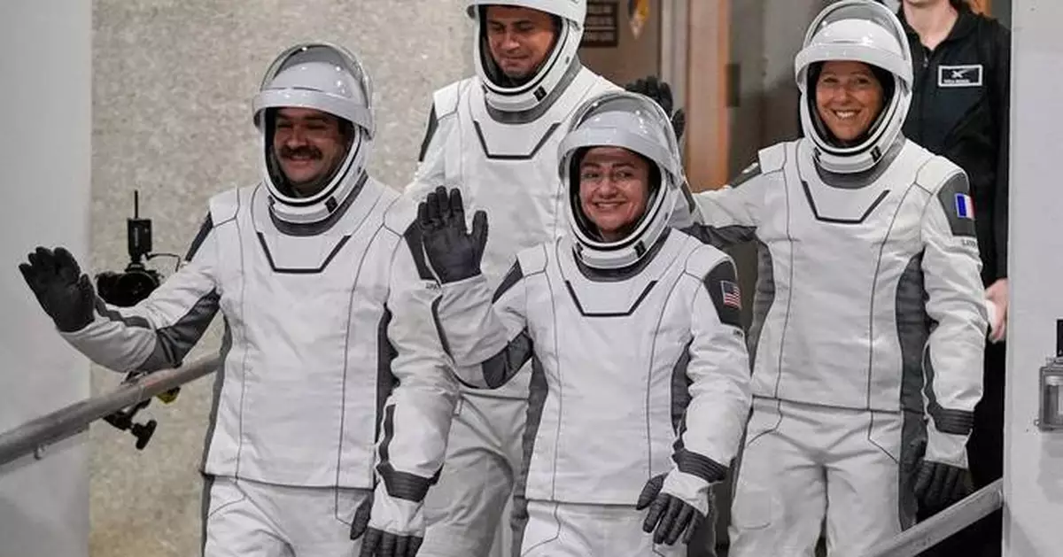 Four new astronauts arrive at the International Space Station to replace NASA's evacuated crew