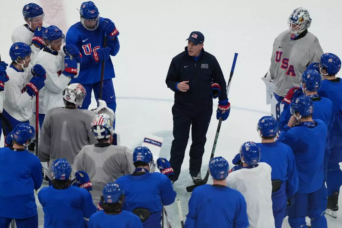 United States' head coach Mike Sullivan speaks doing men's ice hockey practice at the 2026 Winter Olympics, in Milan, Italy, Sunday, Feb. 8, 2026. (AP Photo/Carolyn Kaster)