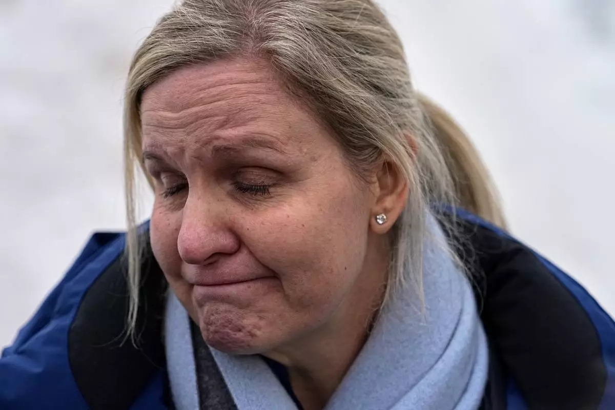International Olympic Committee President Kirsty Coventry during media statement at the start house of the sliding center at the 2026 Winter Olympics, in Cortina d'Ampezzo, Italy, Thursday, Feb. 12, 2026. (AP Photo/Fatima Shbair)