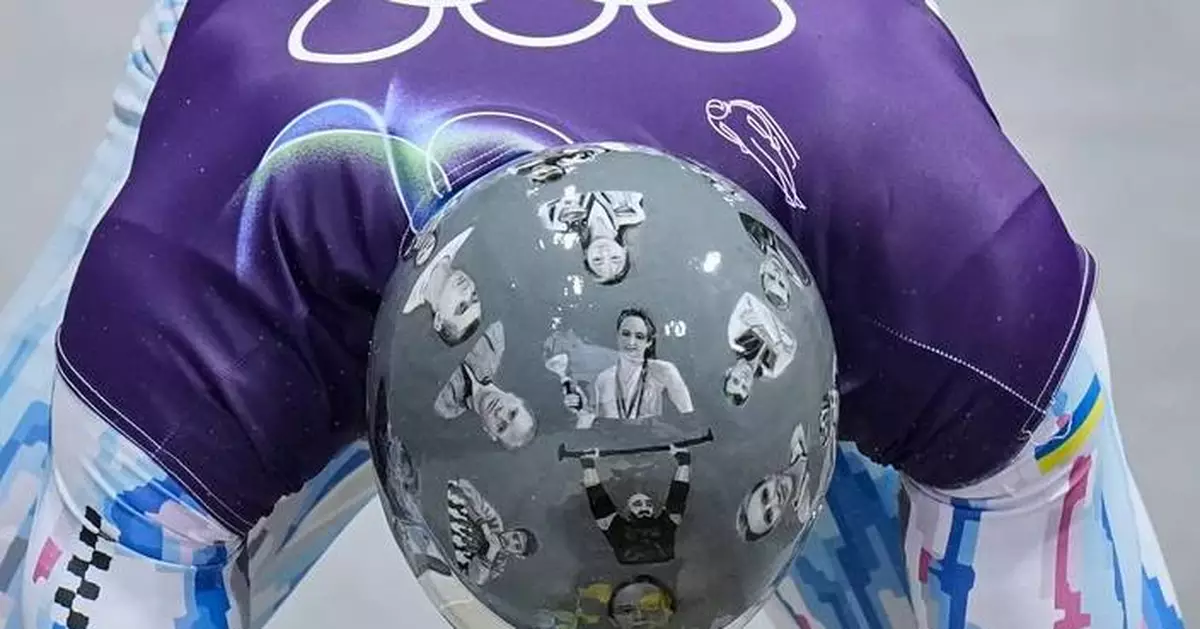 In photos: Ukraine’s Vladyslav Heraskevych out of Winter Olympics over banned helmet tribute