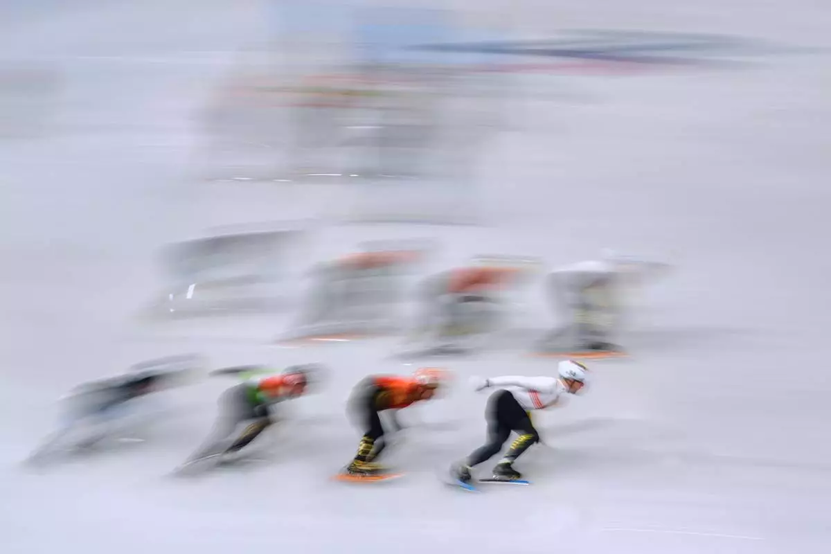 Athletes compete during a short track speed skating men's 5000 meters relay final B at the 2026 Winter Olympics, in Milan, Italy, Friday, Feb. 20, 2026. (AP Photo/Stephanie Scarbrough)