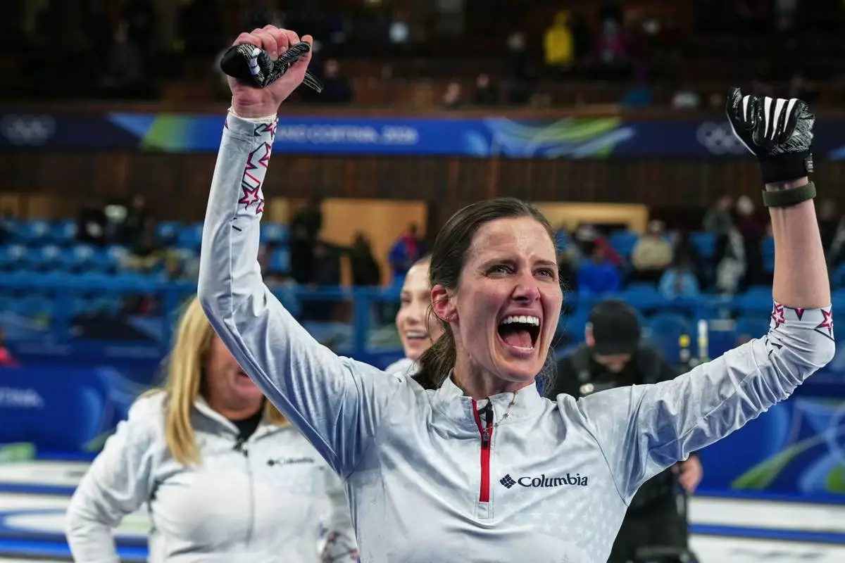 United States' Tara Peterson gestures after the women's curling round robin session against Switzerland, at the 2026 Winter Olympics, in Cortina d'Ampezzo, Italy, Thursday, Feb. 19, 2026. (AP Photo/Misper Apawu)