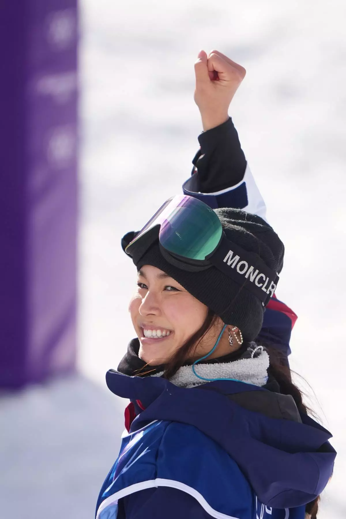 United States' Chloe Kim celebrates during the women's snowboarding halfpipe qualifications at the 2026 Winter Olympics, in Livigno, Italy, Wednesday, Feb. 11, 2026. (AP Photo/Lindsey Wasson)