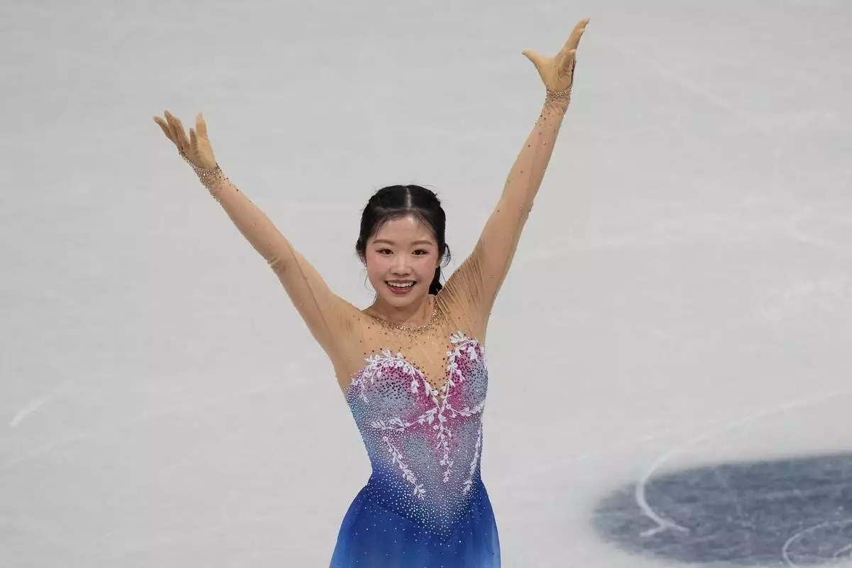 Ami Nakai of Japan competes during the women's figure skating free program at the 2026 Winter Olympics, in Milan, Italy, Thursday, Feb. 19, 2026. (AP Photo/Francisco Seco)