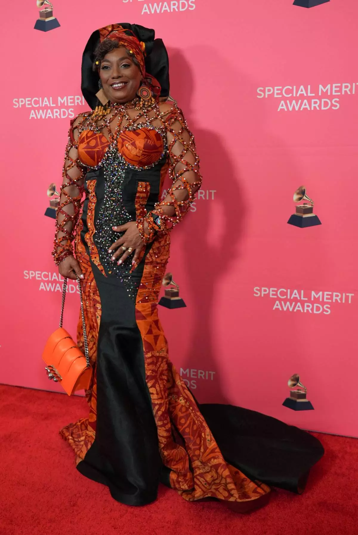 Yeni Kuti arrives at the Recording Academy's Special Merit Awards on Saturday, Jan. 31, 2026, at the Wilshire Ebell Theatre in Los Angeles. (Photo by Richard Shotwell/Invision/AP)
