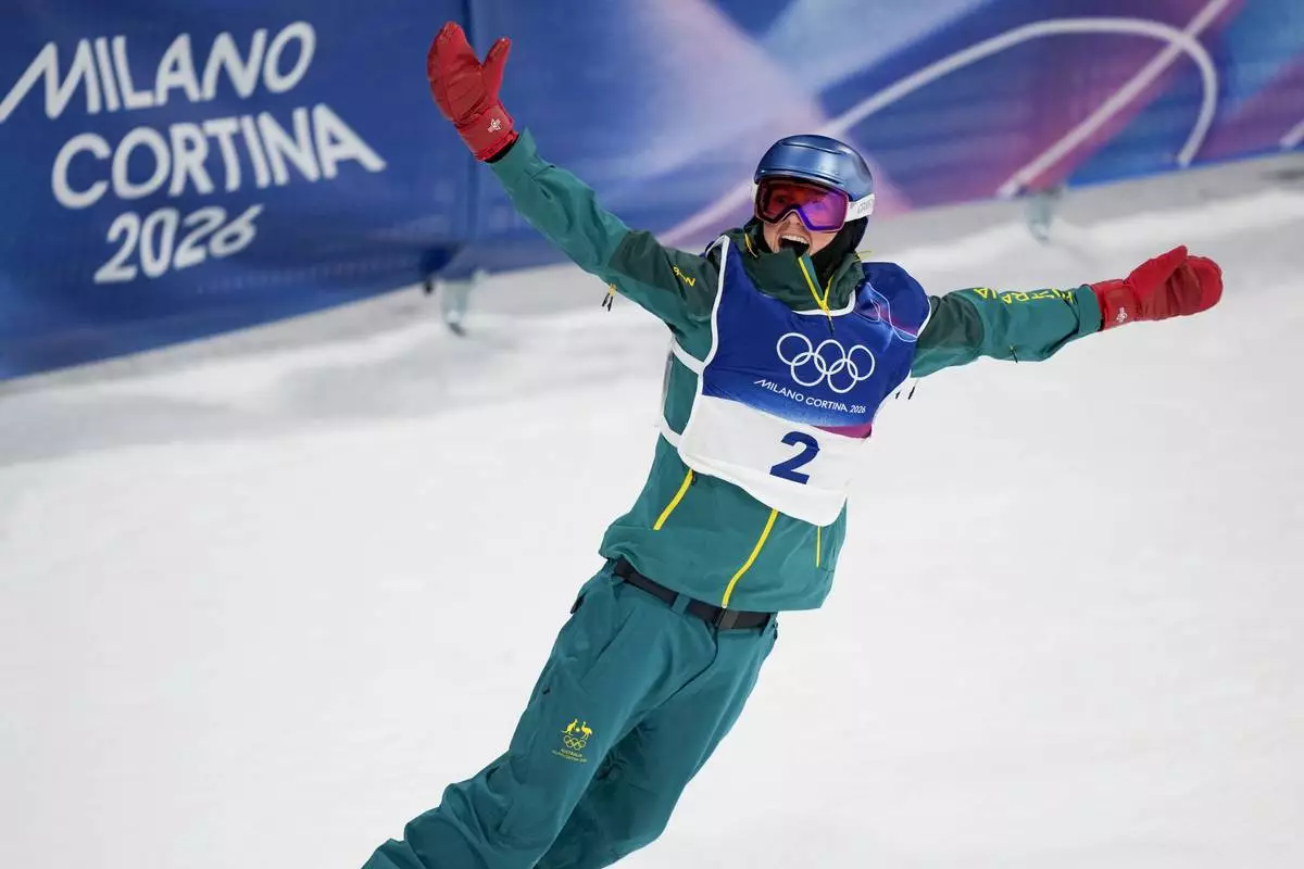 Australia's Scotty James reacts to his run during the men's snowboarding halfpipe finals at the 2026 Winter Olympics, in Livigno, Italy, Friday, Feb. 13, 2026. (AP Photo/Julia Demaree Nikhinson)