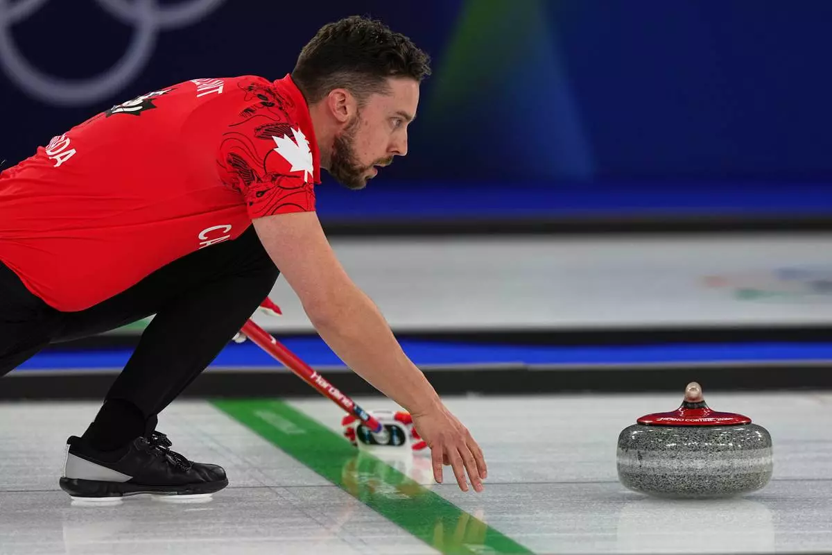 Canada Canada's Brett Gallant in action during the mixed doubles round robin phase of the curling competition against the Czech Republic, at the 2026 Winter Olympics, in Cortina d'Ampezzo, Italy, Wednesday, Feb. 4, 2026. (AP Photo/Fatima Shbair)