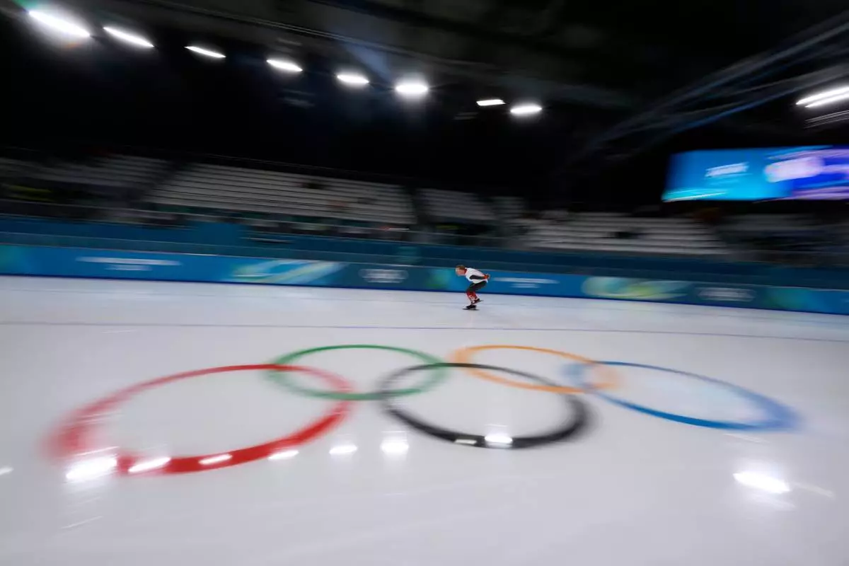 Ted-Jan Bloemen of Canada warms up prior to competing in the men's 5,000 meters speedskating race at the 2026 Winter Olympics, in Milan, Italy, Sunday, Feb. 8, 2026. (AP Photo/Luca Bruno)