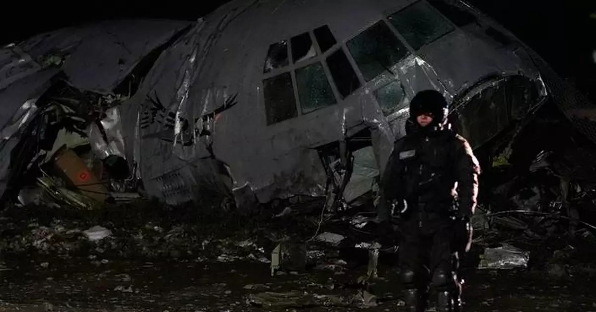 Cargo plane carrying money crashes near Bolivia's capital, killing at least 15 people, official says