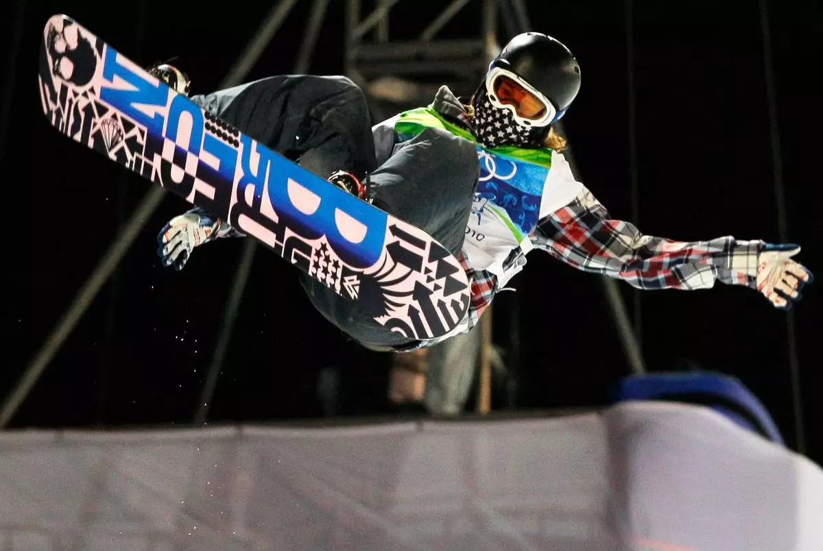 FILE - Shaun White of the United States, competes in the men's snowboard halfpipe final competition at the Vancouver 2010 Olympics in Vancouver, British Columbia, Wednesday, Feb. 17, 2010. (AP Photo/Gerry Broome, File)